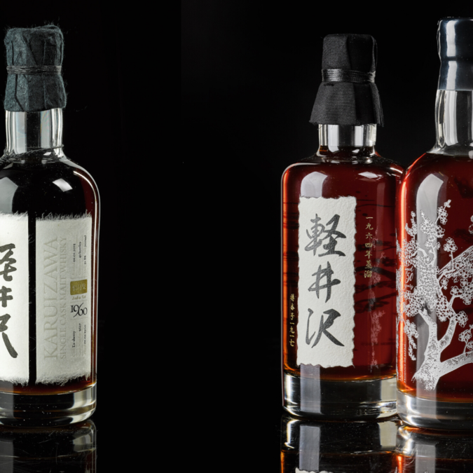 3 bottles of Karuizawa against a black background