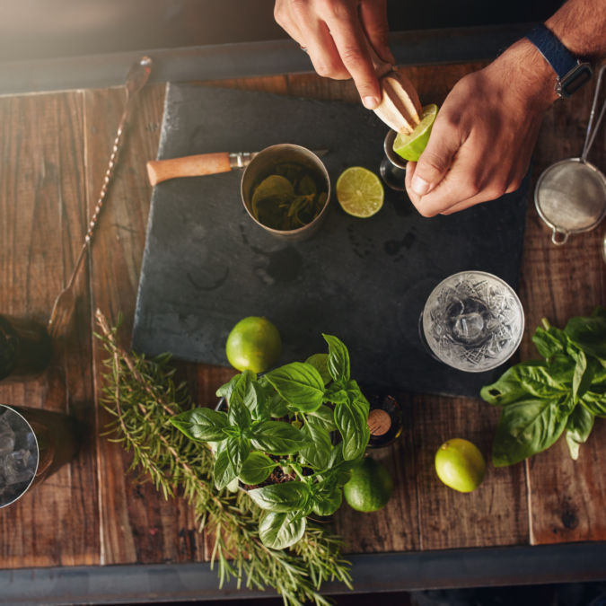 Bartender experimenting with creating new cocktails