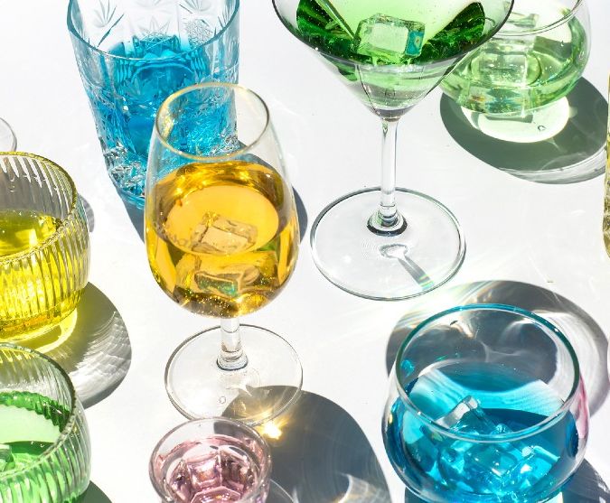 range of colourful liqueurs in glasses