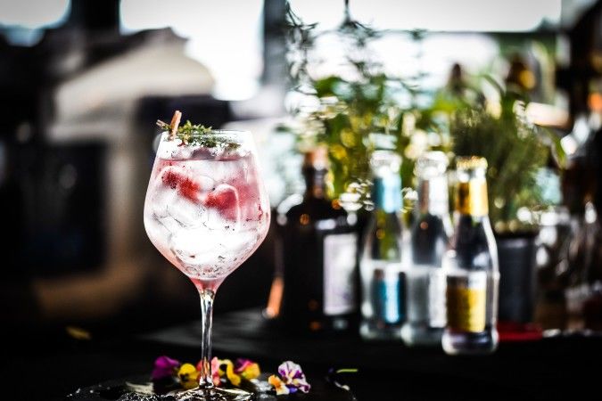 copa glass filled with flavoured vodka and tonic