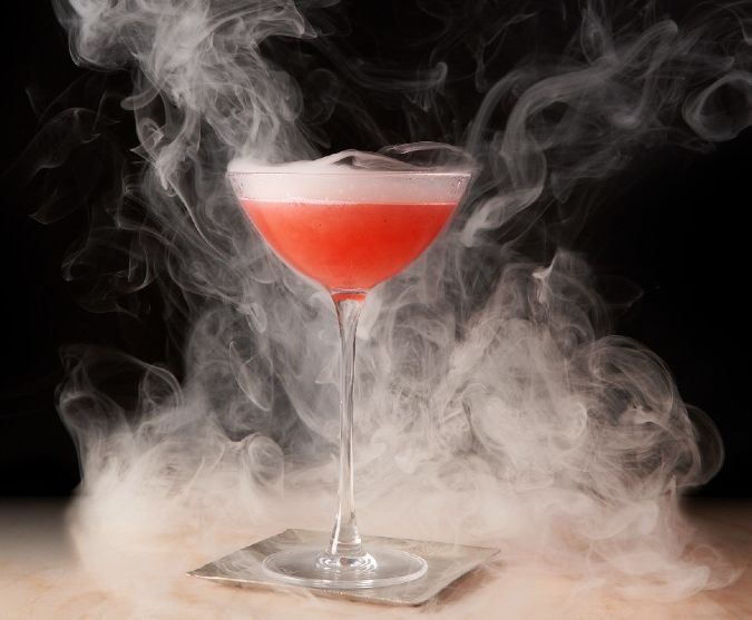 cocktail at holy bar, london, uk