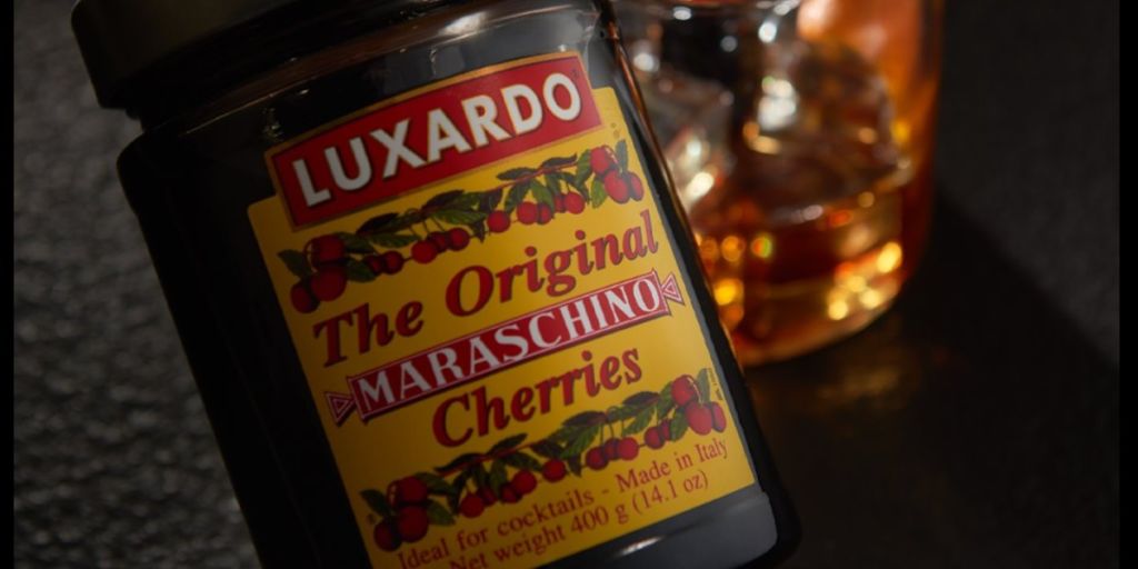 Luxardo's Original Maraschino Cherries behind the cult cocktail garnish