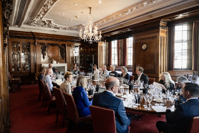 Guests sitting around a table for the Laurent-Perrier Grand Siecle tasting