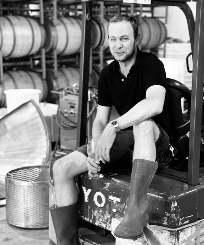 Vilafonté winemaker Chris de Vries sitting on a forklift truck