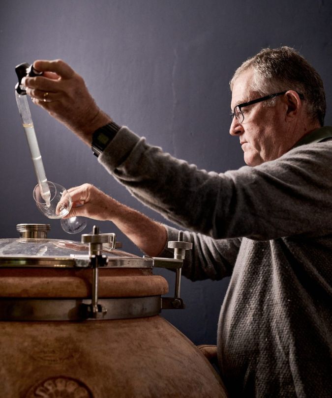 john malan of simonsig family vineyards extracting cap classique wine from vessel