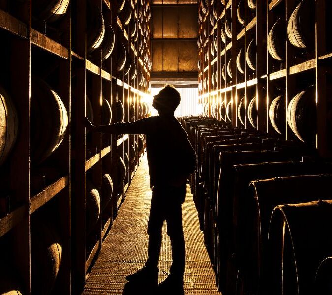 inside warehouse of paul john whisky distillery