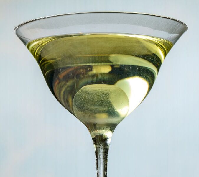 cocktail in martini-style glass at utopic bar