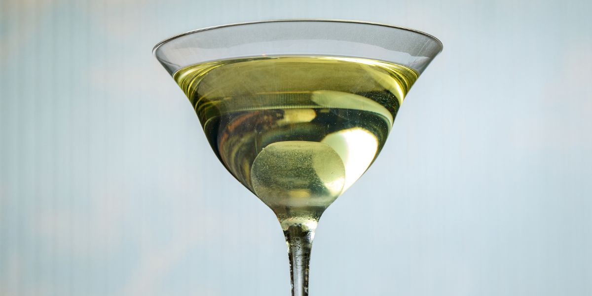 cocktail in martini-style glass at utopic bar