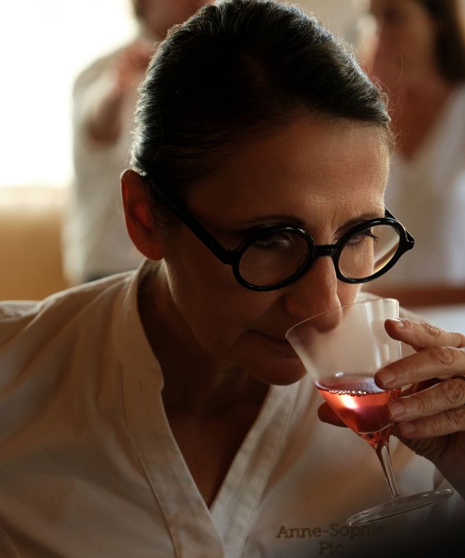 chef anne-sophie pic drinking cocktail at bar utopic