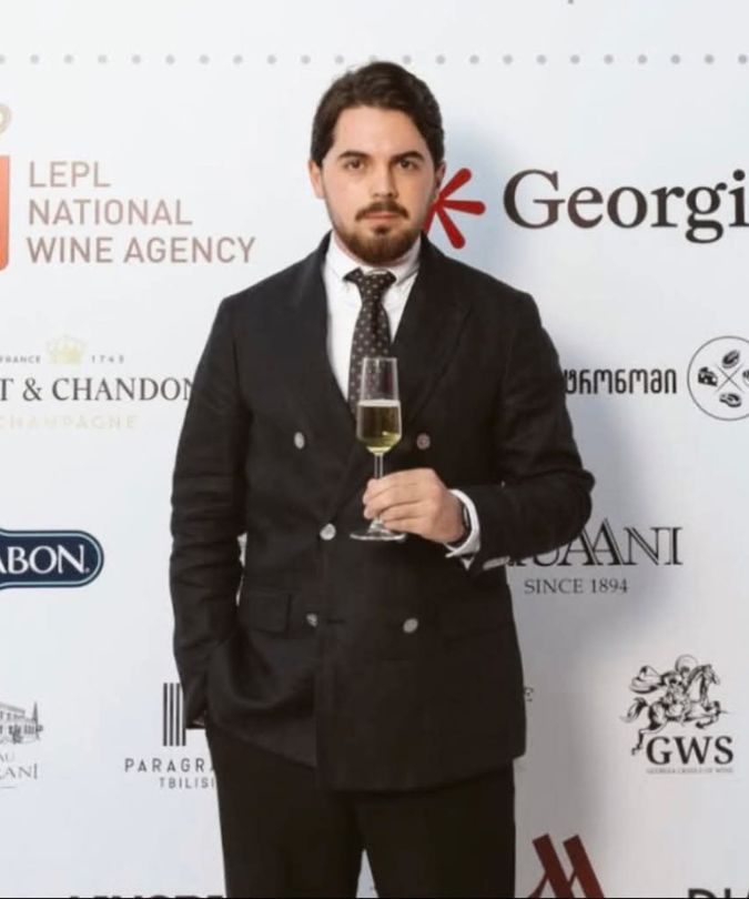 Luka Chikhradze posing with wine glass