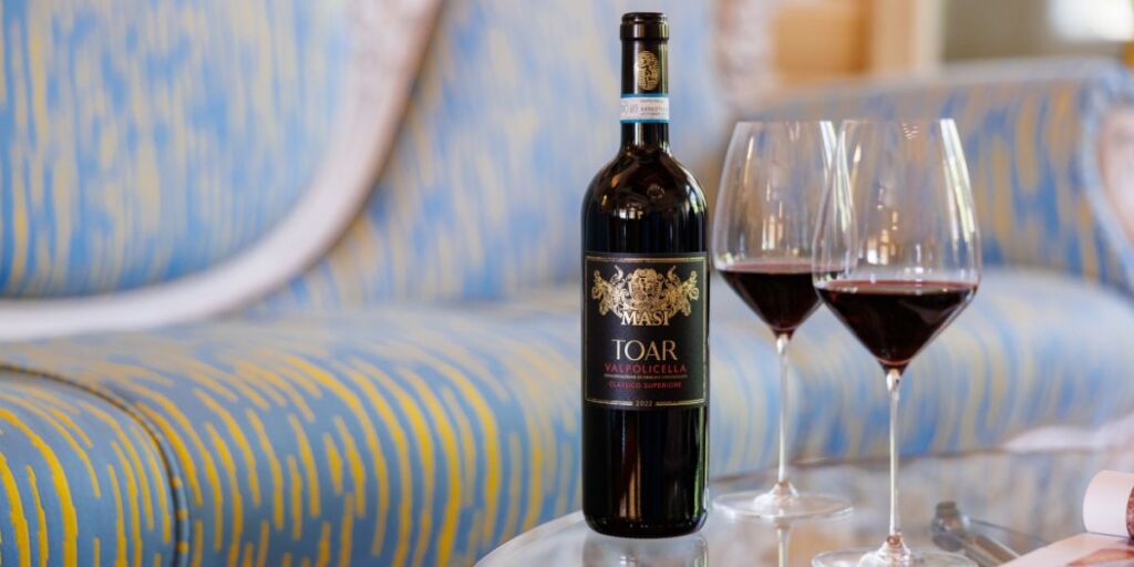 masi toar wine with glasses