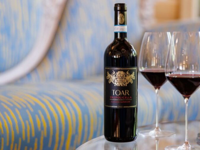 masi toar wine with glasses