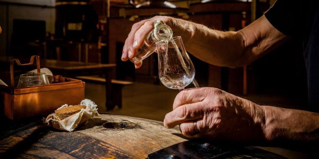 Liquid from barrel to glass at Cognac Frapin distillery