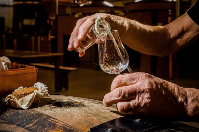 Liquid from barrel to glass at Cognac Frapin distillery