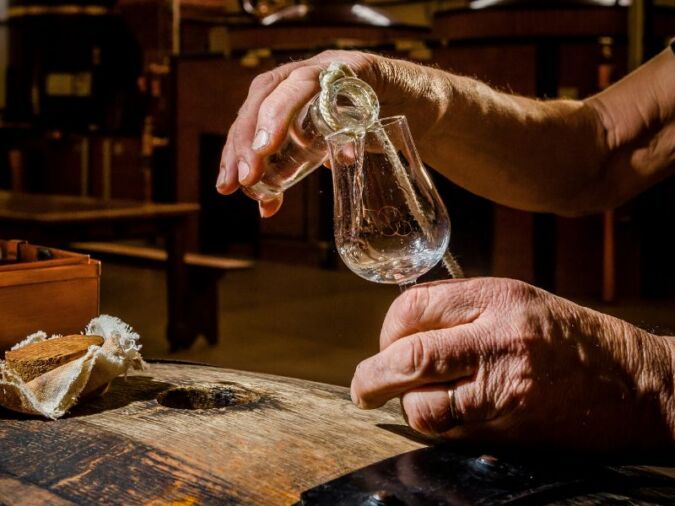 Liquid from barrel to glass at Cognac Frapin distillery