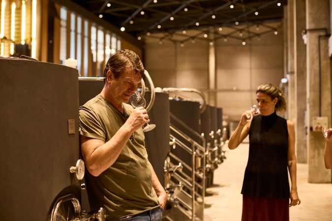 winemakers nosing wine in the Monte Astral winery