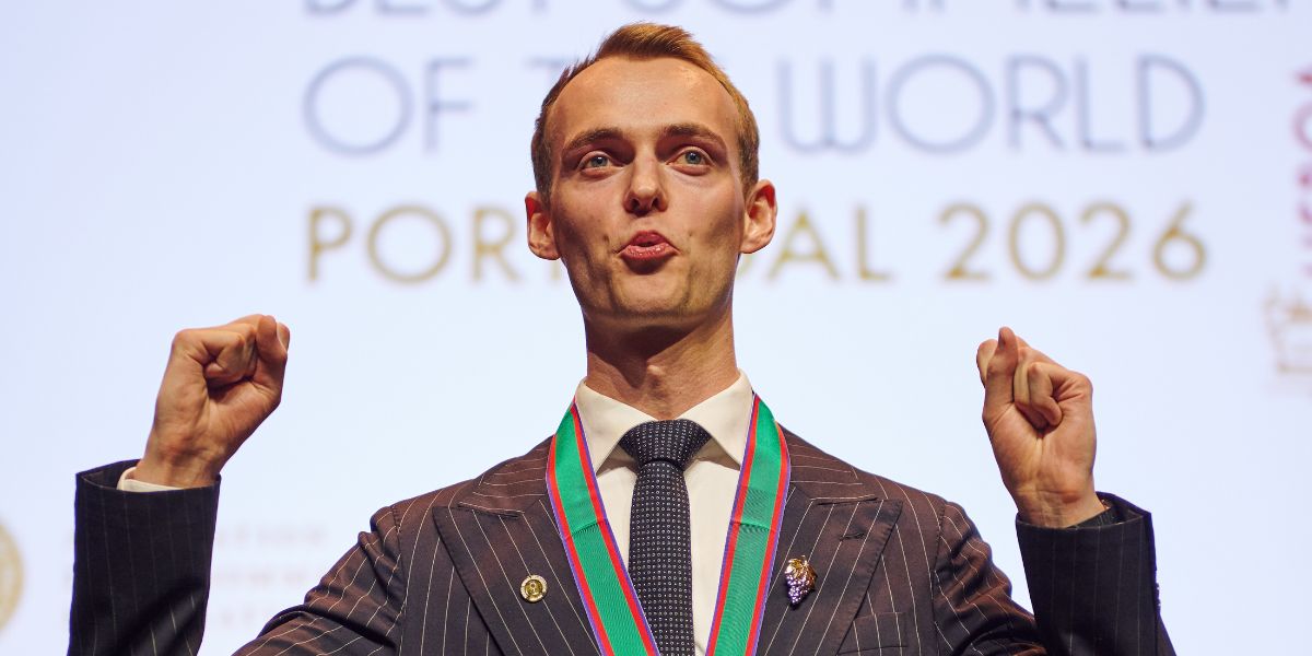 nikolai haram svorte on stage celebrating winning ASI best sommelier of the world